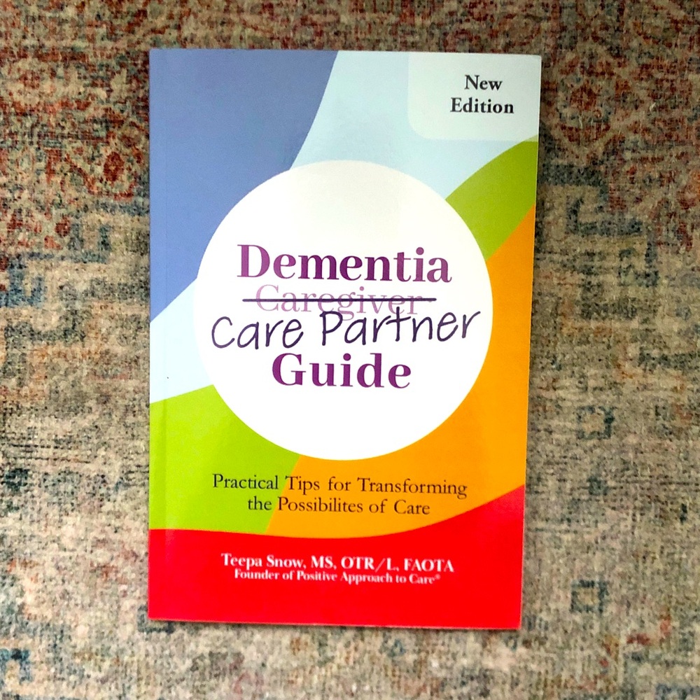Positive Approach to Care Book - Purple and Blue Back Cover